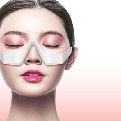 Under eye massager wand with heat and vibration for dark circles