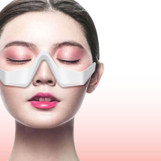 Under eye massager wand with heat and vibration for dark circles