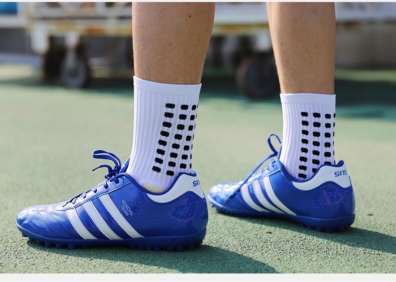Mid-calf anti-slip grip socks with traction pads for soccer and basketball