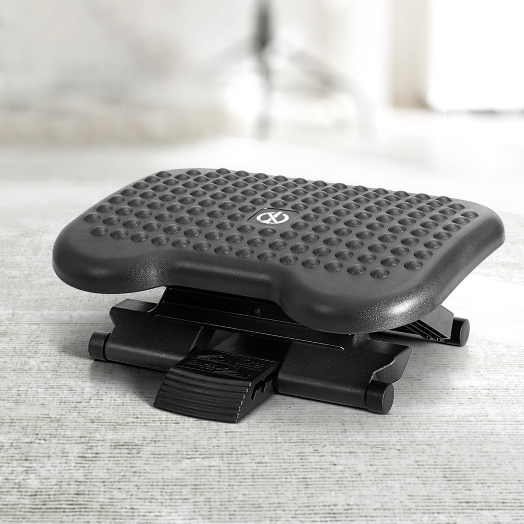 Adjustable under-desk foot rest with acupressure surface