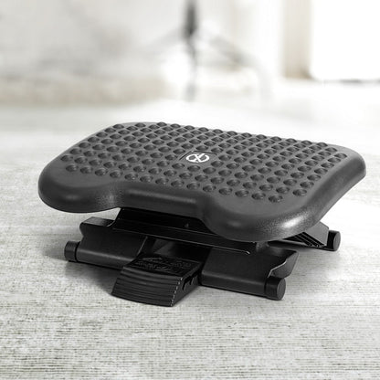 Adjustable under-desk foot rest with acupressure surface