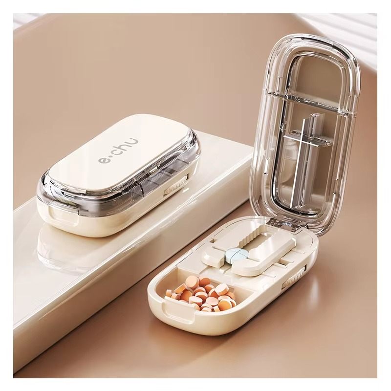Adjustable quartering pill cutter with storage compartments box