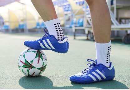 Mid-calf anti-slip grip socks with traction pads for soccer and basketball