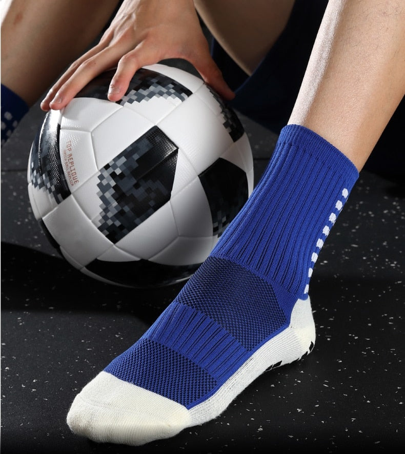 Mid-calf anti-slip grip socks with traction pads for soccer and basketball