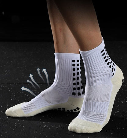 Mid-calf anti-slip grip socks with traction pads for soccer and basketball