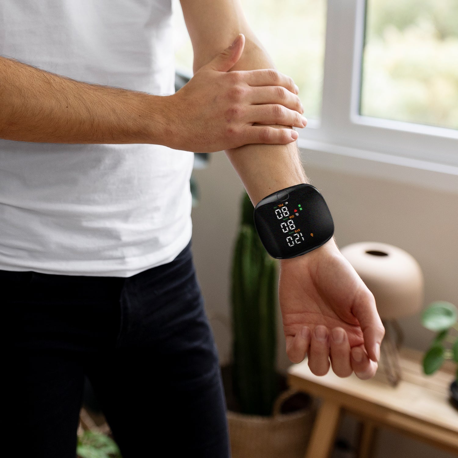 Rechargeable digital wrist blood pressure monitor with backlit LCD