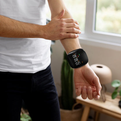 Rechargeable digital wrist blood pressure monitor with backlit LCD