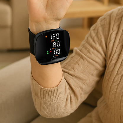 Rechargeable digital wrist blood pressure monitor with backlit LCD