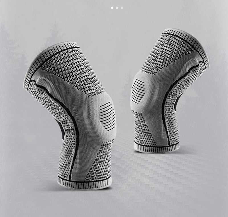 Adjustable knee brace with twin lateral stabilizers and patellar wrap