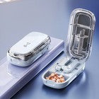 Adjustable quartering pill cutter with storage compartments box