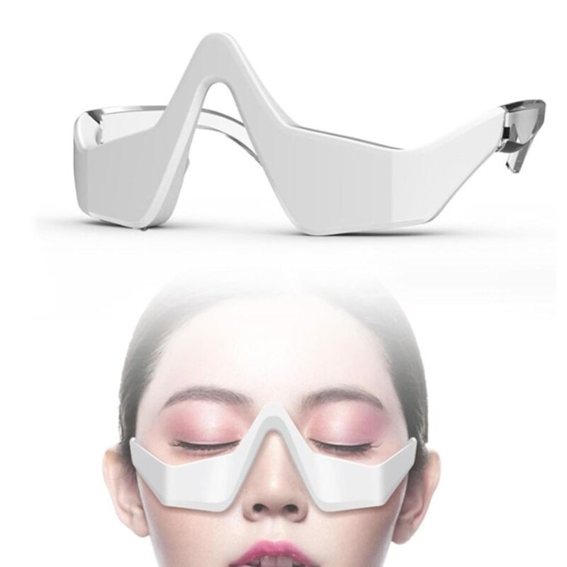 Under eye massager wand with heat and vibration for dark circles
