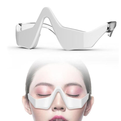 Under eye massager wand with heat and vibration for dark circles